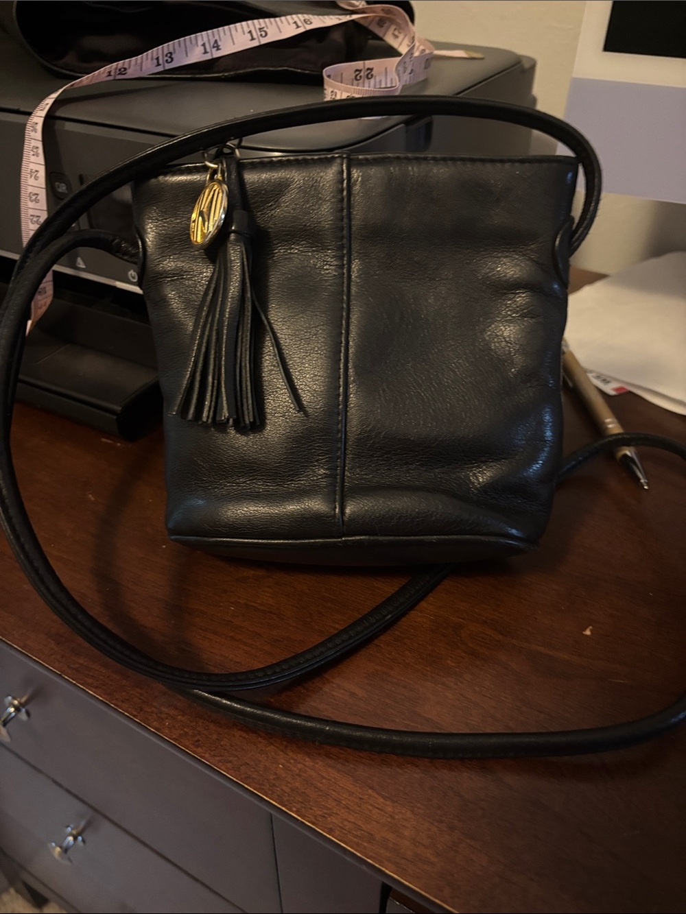 Anne Klein Black Leather Crossbody with Tassel Charm